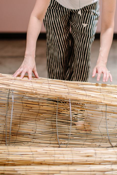 Guys. I have an imaginary beach house. It's gorgeous. It's very Tulum with its warm, colorful and understated beach vibes. That's where this DIY bamboo pendant light I'm sharing today comes from. It can be used outdoors (hello cute patios!), and it is a fun addition to weddings since they are giant and super affordable to make! #ruffledblog Diy Bamboo Projects, How To Make A Rattan Lampshade, Bamboo Lantern Diy, Diy Bamboo Pendant Light, Bamboo Lamp Diy, Rattan Lighting Wedding, Washer Crafts, Diy Clothes Hangers, Rattan Flower Pendant Light