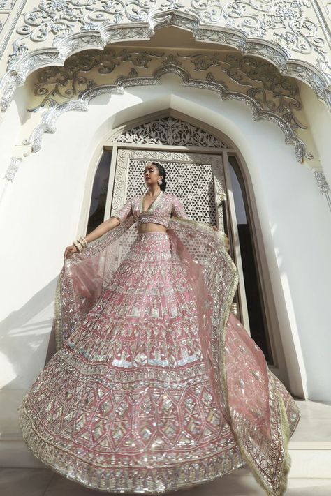 Unfolding perfection and joyful #Nooraniyat emotions in the swirling old rose paradise, our Voluminous Lehenga, and the signature #Noor Bodice embellished in gleaming sequins and metallic fringes is a marvelous culmination of months of diligent artistry Lehenga Fits, Lehenga Manish Malhotra, Contemporary Lehenga, Best Bridal Lehenga, Manish Malhotra Lehenga, Lehenga Pink, Pink Bridal Lehenga, Engagement Lehenga, Lehenga Bridal