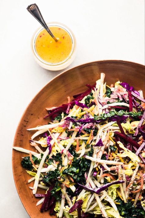 Vibrant Winter Slaw with Citrus Vinaigrette ~ a healthy low calorie side dish salad packed with vitamins, minerals, and lots of fiber. #coleslaw #salad #recipe #easy #healthy #lowcalorie #kale #cabbage #sidedish Citrus Coleslaw, Winter Coleslaw, Winter Slaw, Low Calorie Sides, Low Calorie Side Dishes, Citrus Salad Recipes, Thanksgiving Salad Recipes, Low Calorie Salad, Salad Keto