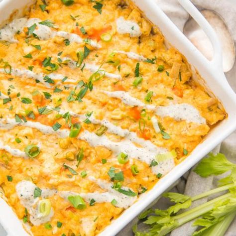 This healthy creamy paleo buffalo chicken casserole with ranch and cauliflower rice is the ultimate paleo buffalo chicken casserole! With a super creamy buffalo-ranch sauce, this Whole30, low carb, keto friendly dinner recipe is so easy to throw together and is a quick main course you'll fall in love with. #lowcarb #whole30 #paleo #cauliflowerrice #keto #healthy #dinner #recipe #maincourse #easy #quick #cleaneating #realfood Paleo Chicken Casserole, Buffalo Chicken And Rice, Paleo Buffalo Chicken Casserole, Ranch Cauliflower, Paleo Buffalo Chicken, Recipe With Rice, Paleo Ideas, 40 Aprons, Ranch Sauce