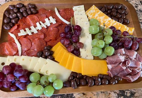 5 Tailgating Tips for a Football Charcuterie Board Super Bowl Cheese Board, Football Snack Charcuterie Board, Kc Chiefs Charcuterie Board, Super Bowl Charcuterie Board Easy, Basketball Charcuterie Board, Football Tailgate Charcuterie Board, Football Meat And Cheese Tray, Football Fruit Tray Ideas, Super Bowl Charcuterie Board Ideas