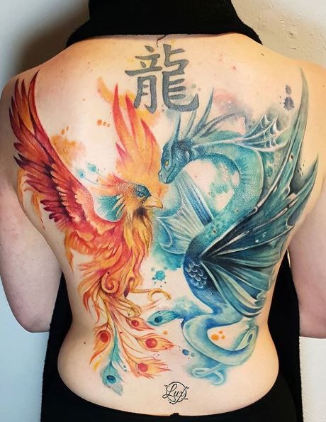 Phoenix Tattoos - Designs, Ideas & Meaning Dragon Tattoo Ideas For Women, Phoenix Back Tattoo, Phoenix And Dragon, Phoenix Tattoo Feminine, Dragon Tattoo Ideas, Fierce Dragon, Phönix Tattoo, Baby Tattoo Designs, Phoenix Tattoos