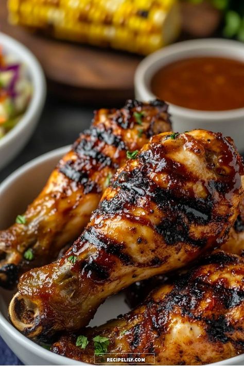 These delicious grilled BBQ chicken drumsticks are perfect for your next cookout! Marinated to perfection and caramelized on the grill, they offer a smoky flavor that pairs beautifully with a side of corn and coleslaw. Get ready for a crowd-pleasing dish that everyone will love! Pan Bbq Chicken, Bbq Grilled Chicken Recipes, Bbq Chicken Drumsticks, Bbq Sauce Chicken, Grilled Bbq Chicken, Cast Iron Griddle, Bbq Chicken Recipes, Chicken Drumsticks, On The Grill