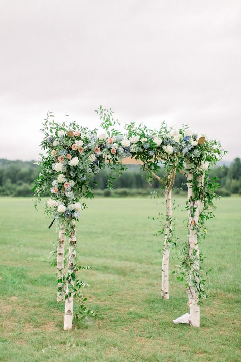 Florist Blomma Flicka created a ceremony chuppah with birch wood, hydrangeas, roses, and greenery. Because Josh is Jewish, "it was really important to us that we got married under a chuppah and that Josh broke the glass," Lauren says. "I still remember the loud 'Mazel Tov!' that echoed through the field once he did it!" Birch Chuppah, Chuppah Flowers, Whimsical Wedding Theme, Olive Branch Wedding, Wedding Chuppah, Funky Wedding, Stowe Vermont, Wedding Ceremony Ideas, Vermont Wedding