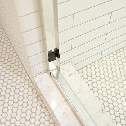 White Penny tile floor/gray grout. White subway tile shower with gray grout Penny Tile Shower Floor, White Penny Tile, Penny Tiles Bathroom, Penny Tile Floors, White Grout, Subway Tile Showers, Fitted Bathroom Furniture, Penny Round Tiles, Grey Grout