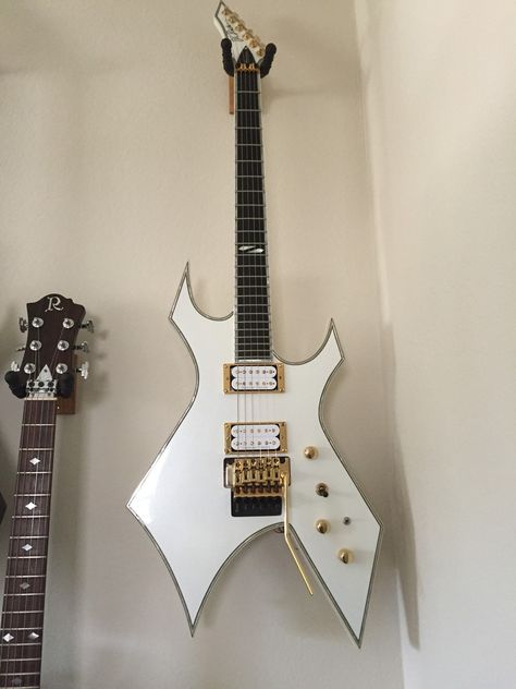 BC Rich Warlock Bc Rich Guitars Warlock, B C Rich Warlock, Bc Rich Warlock Guitar, Electric Guitar Warlock, Cool Guitar Designs, Warlock Guitar, Bc Rich Warlock, Bc Rich Guitars, White Guitar