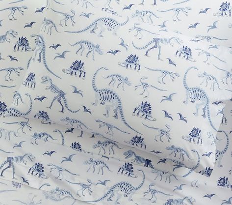 Organic Dinosaur Bones Glow-in-the-Dark Kids' Sheet Set | Pottery Barn Kids Dino Bones, Dinosaur Skeletons, Dinosaur Bedroom, Bedroom Theme, Kids Sheets, White Sheet, Dinosaur Skeleton, Dark Material, Dinosaur Bones