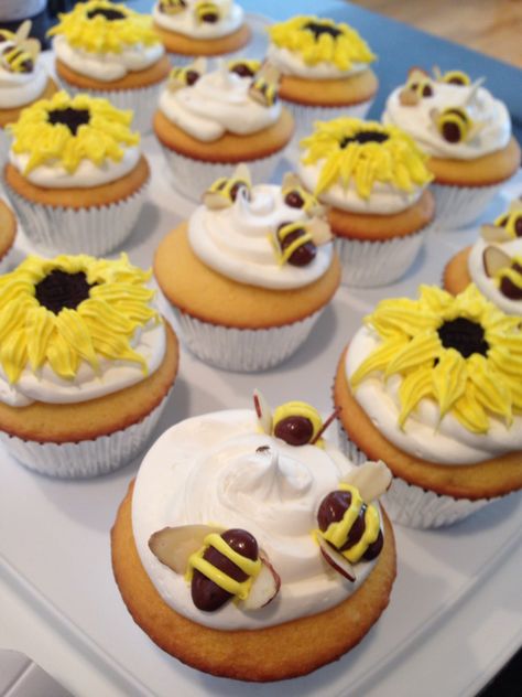 Summer cupcakes - lemon cupcake with cream cheese frosting with chocolate covered raisins bees and Oreo sunflowers Oreo Sunflowers, Cupcake With Cream Cheese Frosting, Dirt Cupcakes, Bumblebee Birthday, Cupcakes Lemon, Moms 60th, Lemon Cupcake, Sunflower Cupcakes, Chocolate Covered Raisins