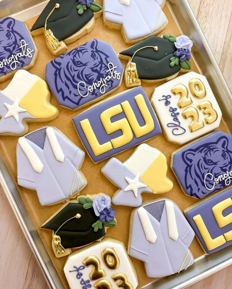 lsugraduation • Instagram 2024 Grad Cookies, Lsu Graduation, Lsu Cookies, Utsa Graduation Cookies, College Signing Day Cookies, Cookie Company, Graduation Cookies, Grad Parties, Sugar Cookies Decorated