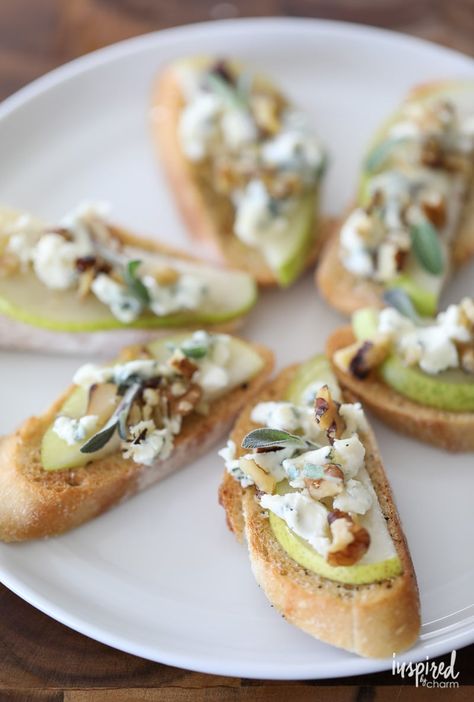 Blue Cheese, Pear, and Honey Crostini Blue Cheese Pear Honey Crostini, Pear Blue Cheese Crostini, Blue Cheese Canape, Pear And Goat Cheese Crostini, Pear Recipes Appetizer, Pear Cheese Appetizer, Pear Crostini Appetizers, Appetizers With Pears, Pear And Blue Cheese Appetizer