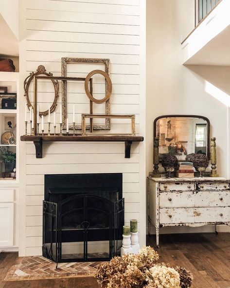 34 Stylish Farmhouse Fireplace Setups You'll Want to Replicate ASAP Farmhouse Fireplace Ideas, Hearth Decor, Wooden Blanket Ladder, Farmhouse Fireplace Decor, Hippie House, Frame Collage, Farmhouse Fireplace, Brass Candlestick, Faux Fireplace