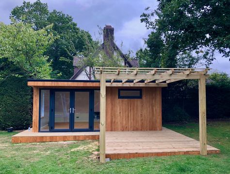 A beautiful garden room with a bespoke decking area and pergola. Cabin Garden, Upvc French Doors, Decking Options, Courtyard Ideas, Building Extension, Tranquil Garden, Cedar Cladding, Decking Area, Tiny House Loft