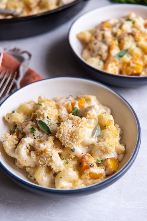 Butternut squash is roasted until tender before being mixed into a homemade cheese sauce. The Butternut Squash Mac and Cheese is then baked until it reaches golden brown perfection! The butternut mac and cheese is made primarily on the stovetop, but I like to finish it off in the oven to crisp up the panko breadcrumbs on top. Enjoy this mac and cheese as a side to your favorite entrees — such as baked chicken breasts, pork chops, steak, or your holiday favorites — or serve larger portions to eat Butternut Squash Mac And Cheese, Homemade Cheese Sauce, Baked Mac N Cheese, Homemade Cheese, Baked Chicken Breast, Cheese Sauce, Mac N Cheese, Butternut Squash, Pork Chops