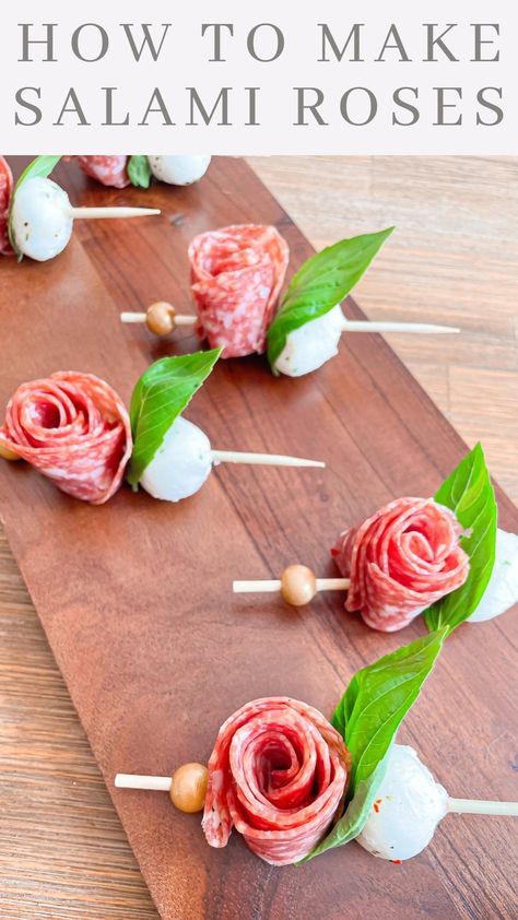 LEAH FEREZAN | SALAMI ROSES Ingredients: Salami Basil Mozzarella Balls Directions: Take 4 pieces of salami and overlap them just a bit. Then fold in… | Instagram How To Make Salami, Basil Mozzarella, Mozzarella Balls, Fancy Appetizers, Charcuterie Recipes, Cheese Sticks, Appetizers Easy, Toothpick, Creative Food