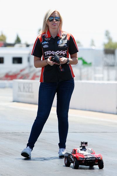 Courtney Force, NHRA's winningest female driver, races a remote controlled car against her fiance, INDYCAR driver Graham Rahal, during a racing skills challenge at Sonoma Raceway on July 22, 2015 in Sonoma, California. Courtney Force, Female Racers, Drag Racer, Indy Cars, Car Humor, Force, Drag Racing, Sports Women, Race Cars