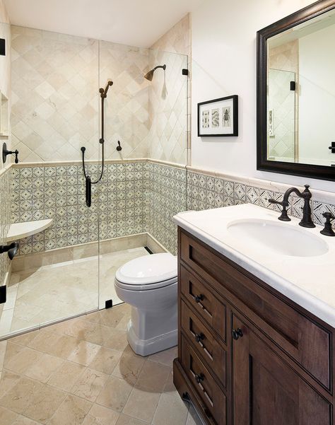 Spanish Mediterranean Elegance guest bathroom with hand painted tile wainscotting and limestone tile | Santa Barbara Mediterranean Bathroom Spanish Style, Hacienda Bathroom, Mediterranean Style Bathroom, Spanish Mediterranean Homes, Spanish Style Bathrooms, Spanish Bathroom, Mediterranean Bathroom, Bathroom Remodel Inspiration, Santa Barbara Style