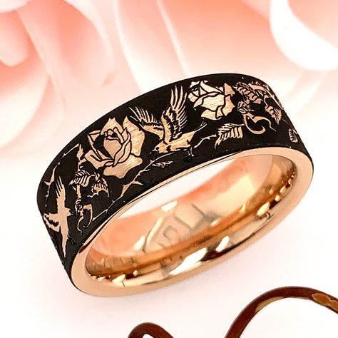 Add something unique and elegant to your jewelry collection. This wedding ring is crafted from rose gold plated tungsten carbbide with deluxe rounded comfort fit interior. The ring features a beautiful design with ravens & roses. Raven is a spirit bird. When you need spiritual rebirth, listen to her warnings respectfully. She is there to protect and guide. The ring is true to size and having your finger size properly measured before ordering is must. It is heavy enough to be felt and pretty Rose Gold Tungsten Ring, Black Tungsten Wedding Band, Mens Wedding Ring, Garnet Engagement Ring, Tungsten Wedding Band, Tungsten Mens Rings, Engraved Ring, Black Tungsten, Personalized Ring