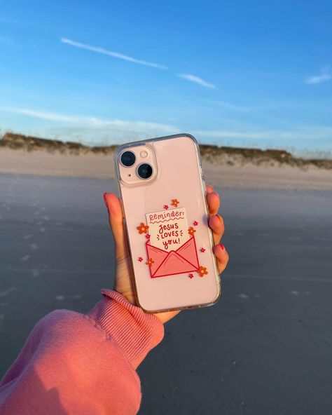 ALSO dropping on Friday August 2nd… new phone cases !!! Once again, these have been suchhh a work in progress, and I am beyond excited to launch them 🥹🫶🏼💖🌺 There will be a white case option, a pink case option, and a clear case!! The white + pink cases have the same hand drawn design (the cute little “stamps” with doodles & words about Jesus!), while the clear case has our “Reminder: Jesus Loves You” design on it 💌 These will fit most iPhones and a few Samsung options! I’ll give more info... Christian Phone Case Aesthetic, Aesthetic Christian Phone Cases, Bible Phone Cases, Jesus Phone Cases, Clear Phone Case Ideas, Phone Cases Clear, Christian Iphone Cases, Doctor Halloween, Christian Phone Case