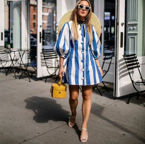 Blue and white striped dress with big sleeved a boxy purse ,wide beamed hat and white heels. Summer outfit ideas. Blue And White Striped Dress Outfit, Oversized Striped Spring Dresses, Striped Puff Sleeve Summer Dress, Collared Striped Beach Dress, Blue And White Striped Beach Dress, Big Sleeves, Style Inspiration Casual, Blue Striped Dress, White Heels