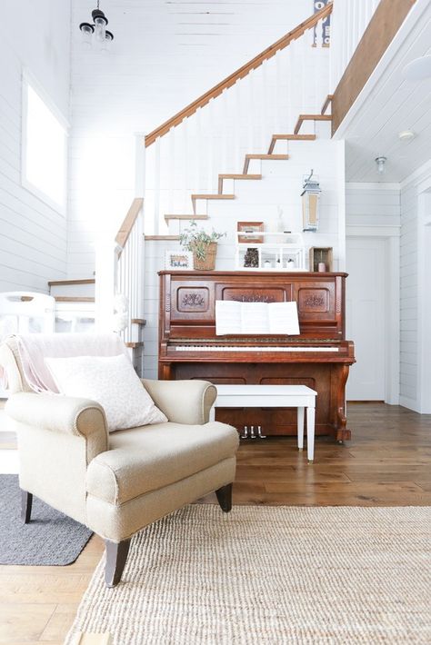 Piano By Stairs, Modern Piano Bench, Piano In Foyer Entryway, Piano Area, Grand Piano Living Room, Piano Chair, Piano Living Rooms, Wood Piano, Piano Forte