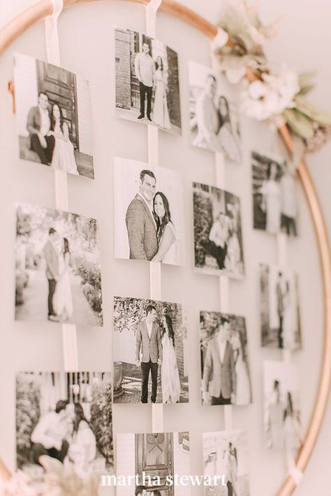 If you had engagement portraits taken, you'll want to show off the results on the big day. Engagement photos of the bride and groom were secured with white ribbon and displayed in a metal hoop for this modern piece. #weddingideas #wedding #marthstewartwedding #weddingplanning #weddingchecklist Creative Ways To Display Photos, Ways To Display Photos, Wedding Photo Display, Bridal Shower Photos, Organic Elements, Display Photos, Photo Display, Wedding Party Favors, Bridal Shower Favors