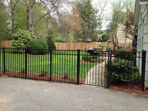 Mix it up! Aluminum around the driveway to keep the pets and kids safe in the yard and Wood for perimeter privacy! #bergenfence #fencestyles #petfriendly #childsafety #backyard #woodfence #aluminumfence Dog Fence Around Patio, Mixed Fencing Ideas, Black Aluminum Fence Front Yard, Mixing Fence Styles, Dog Yard Fence, Backyard Dog Area, Driveway Fence, Landscape Diy, House Flip