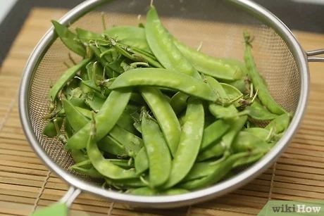 How to Cook Snow Peas: 14 Steps (with Pictures) - wikiHow Snow Peas Recipe, Snow Peas, How To Cook, Food Recipe, Stir Fry, Food Dishes, Celery, Peas, Green Beans