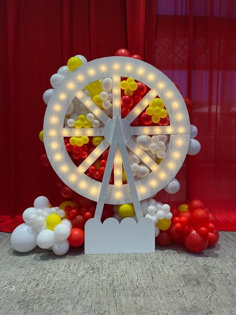 Check out this 8.5' tall Ferris Wheel: available to rent at your next event! We are local to Phoenix AZ and serve the entire valley. This Ferris Wheel lights up with marquee style lighting and will be sure to add a wow factor at your next party. Don't forget to style it up with balloons, we work with the BeSt balloon vendors! #FerrisWheel #FerrisWheelProp #Backdrops #EventRentals #CarnivalParty Circus Theme Decorations, Ferris Wheel Decor, Carnival Event, Event Backdrops, Circus Birthday Party Theme, Carnival Birthday Party Theme, 1st Birthday Party Themes, Wheel Decor, Yellow Balloons