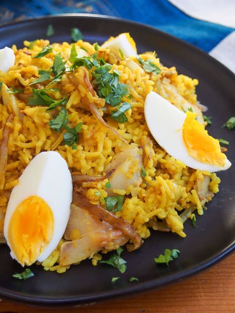 Kedgeree is a hearty and comforting mix of smoked fish and rice with curry flavors. It's a tasty dish that you could enjoy any time of day. Rice With Curry, Indian Bread Naan, December Meals, Kedgeree Recipe, Fish And Rice, Vegetarian Rice Recipes, Rice And Lentils, Fish Rice, Smoked Haddock