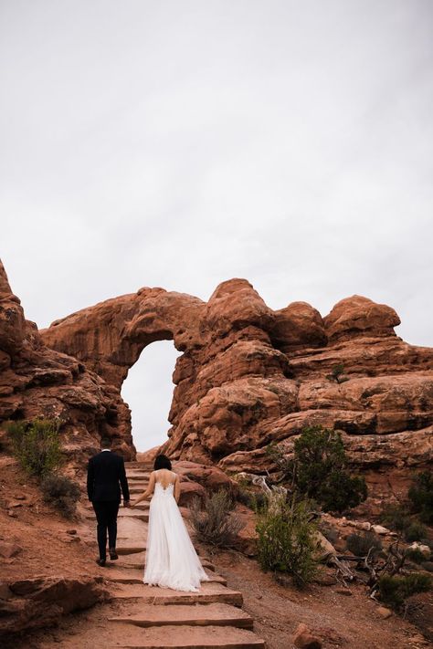 elopement first look in arches national park | desert elopement | moab wedding photographer | the hearnes adventure photography | www.thehearnes.com Arch Photography, Moab Wedding, Sedona Wedding, National Park Elopement, Valley Of Fire, Park Elopement, Succulent Wedding, Adventure Photography, Arches National Park