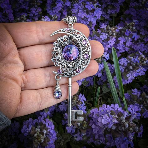 "This handmade fantasy moon key necklace is magical, indeed!  With an artsy crescent moon and high quality Swarovski crystals, this piece of fantasy jewelry will truly make you sparkle.  It would also make an excellent gift for lovers of fairies and magical things! The magical key pendant measures a generous 3\" tall and 1.5\" wide and will come on a silver toned chain in the length of your choice.  If you are unsure what length you need, I can add 2\" of additional chain to make it adjustable.  For example, I could make it 18\" to 20\" adjustable.  Just send me a note along with your order. Each piece is hand made and shipped from the United States in a free complimentary gift box! Thanks for looking and please check this key necklace out with blue crystals necklaces: https://www.etsy.com Magical Jewelry Pendants, Fantasy Jewelry Necklace, Fantasy Jewelry Magic, Magical Key, Celestial Witch, Fantasy Moon, Fairy Pendant, Blue Crystal Necklace, Exotic Jewelry