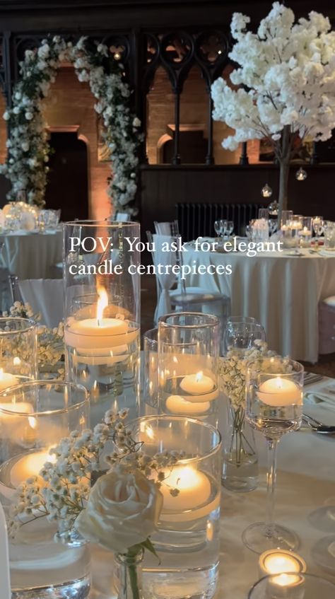 White Candle Lit Wedding, Winter Wonderland Centerpiece Ideas, Pillar Candles Wedding Centerpiece, Candlelight Wedding Reception, Candle Centerpieces Elegant, Candlelit Wedding Reception, Candle Light Wedding, Candelabra Wedding Centerpieces, Pillar Candles Wedding