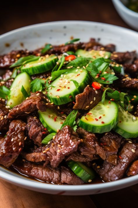 A delicious and refreshing salad with marinated beef and cucumber in a spicy Szechuan sauce. Szechuan Beef, Szechuan Sauce, Marinated Beef, Refreshing Salad, Sriracha Sauce, Fudge Recipes, Cucumber Salad, Cooking Techniques, Rice Vinegar