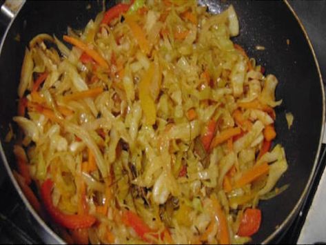 Jamaican Steam Cabbage Recipe and Nutrition - Eat This Much Steamed Cabbage Recipe, Jamaican Steamed Cabbage Recipe, Jamaican Cabbage, Cabbage And Carrots, Steamed Cabbage, Jamaican Cuisine, Jamaican Dishes, Cabbage Recipe, Vegetarian Cabbage