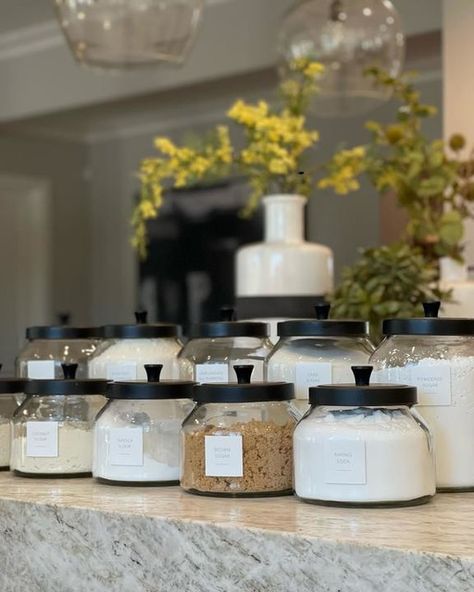 Glass Jars With Black Lids, Pantry Canisters, Black Kitchen Canisters, Kitchen Open Shelves, White Wood Kitchens, Kitchen Jar, Laundry Kitchen, Glass Jar With Lid, Glass Storage Containers