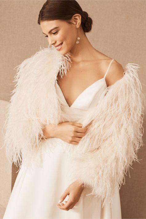 Equal parts glamorous and playful, we love this feathery jacket paired with a sleek slip dress or modern jumpsuit. Bride Jean Jacket, Jacket Trend, Bridal Coat, How To Dress For A Wedding, Bride Jacket, Wedding Coat, Bridesmaid Dresses Formal, Anthropologie Wedding, Winter Bride