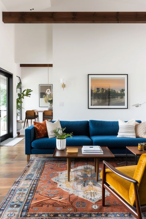 What Do You Need for a Stunning Mid-Century Modern Living Room? – Everyday Inspo Coastal Mid Century Modern Living Room, Mid Century Modern Den, Mid Modern Century Living Room, Mid Century Family Room, Blue Couch Living Room Ideas, Anthropology Home, Modern Blue Sofa, Coastal Mid Century Modern, Mid Century Modern Living Room Design