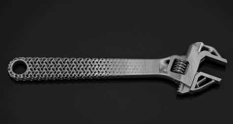 Metal 3D printed wrench demonstrating the blend between lattices and topology optimization. Photo via Frustum Topology Optimization, Lattice Structure, Metal Printing, 3d Printing Business, 3d Printing Industry, Cad Software, Additive Manufacturing, 3d Printed Objects, Generative Design