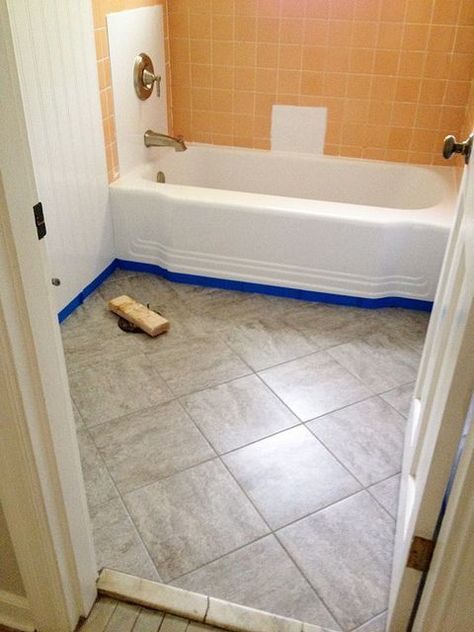 Updating an old bathroom with graoutable peel and stick tiles (6) La Bathroom, Peel And Stick Floor Tiles, Diy Grout, Peel And Stick Floor Tile, Stick Floor Tiles, Faux Wood Flooring, Floor Makeover, Old Bathrooms, Wood Plank Flooring