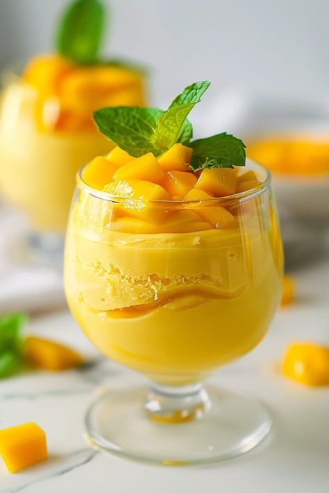 This easy mango mousse will be your new favorite treat! Made with mangoes, honey, and whipped cream, it's a true delight for the palate! Mango Parfait Desserts, Easy Dessert Recipes For Parties, Mango Moose Recipes Desserts, Recipes With Mango Puree, Mango Dessert Recipes Easy, Mango Sherbert, Mango Recipes Dessert, Mango Treats, Hot Dessert Recipes