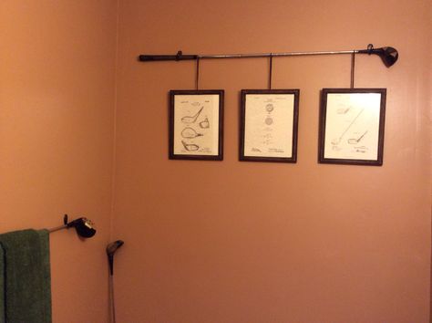 Golf Office Ideas, Golf Theme Office, Golf Theme Bathroom, Golf Decorating Ideas Interior Design, Golf Bathrooms, Golf Club Wall Display, Vintage Golf Room, Hanging Golf Clubs On Wall, Golf Clubs On Wall