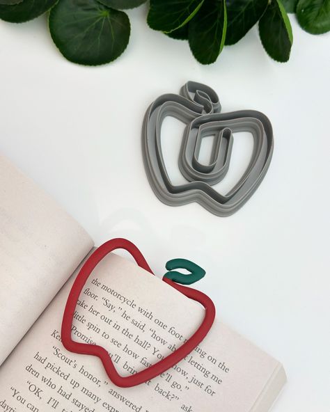 Inspired by my youngest daughter’s school-wide book reading, I am designing so many more paperclip bookmarks! How adorable is this Apple and Leaf Paperclip Bookmark cutter?! Perfect teacher gift idea this holiday season 🍎🎄 Available now! More designs will be dropping tomorrow so stick around! Any requests? www.BloomMercantile.com (link in my stories) #polymerclay #polymerclaycutters #claycutters #bookmarkcutters #polymerclaybookmarks #polymerclaycreations #teachergifts🍎 Paperclip Bookmarks, Youngest Daughter, Book Reading, Polymer Clay Creations, Paper Clip, Teacher Gift, Teacher Gifts, Holiday Season, Polymer Clay