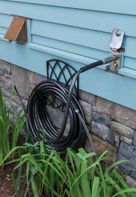 This no-leak, no-drip, never-freeze outdoor faucet system by Aquor Water Systems features a twist-lock design that automatically turns the water on as soon as the connector is inserted. Hose Hideaway, Garden Hose Area Ideas, Exterior Water Faucet, Outdoor Sink Diy Garden Hose, Manufactured Stone Veneer, Outdoor Gathering Space, Paving Design, Clapboard Siding, Wood Columns