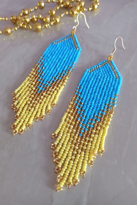 Unique, stylish and delicate earrings are made from high-quality Czech beads and strong synthetic thread. Hook ears made of surgical steel (does not darken, does not cause allergies). Light and comfortable, suitable for everyday wear. Bright and elegant, which attract attention and emphasize your special image. Handmade with love. Summer Blue Beaded Earrings With Fringe, Bohemian Blue Earrings With Beaded Fringe, Blue And Yellow Beaded Earrings, Bohemian Blue Beaded Fringe Earrings, Blue Fringed Beaded Earrings For Festival, Yellow Beaded Earrings Native American, Yellow Beaded Earrings, Beaded Earrings Native, Bracelets Handmade Diy