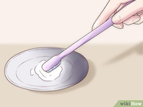 4 Ways to Clean Teeth with Baking Soda - wikiHow Health Bentonite Clay Toothpaste, Pepermint Oil, Make Your Own Toothpaste, Teeth Stain Remover, Baking Soda Toothpaste, Toothpaste Brands, Homemade Toothpaste, Baking Soda And Lemon, Whitening Teeth