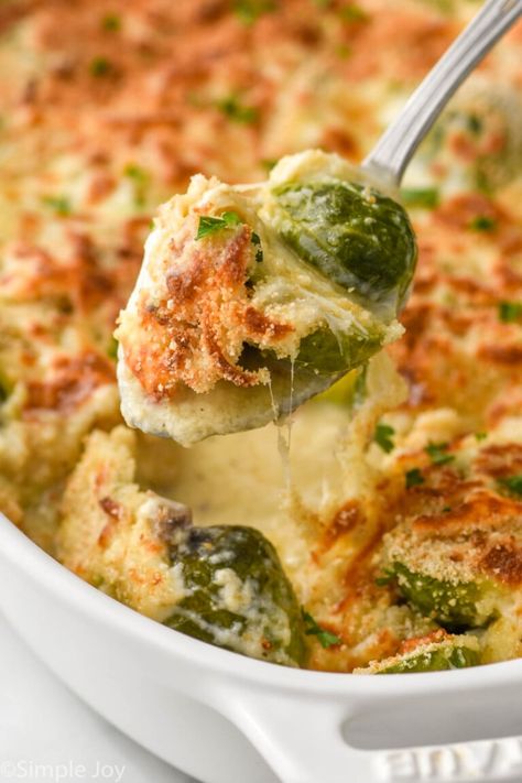 This Baked Brussel Sprouts Casserole is the perfect easy side dish!  Baked in the oven and made with frozen brussel sprouts, it come together with only about 10 minutes of prep time! This side dish recipe is delicious enough for a holiday meal, but easy enough for a weeknight dinner!  Your family will love brussel sprouts after trying this cheesy brussel sprouts casserole! Brussel Sprout Casserole Cream Of Mushroom, Recipes With Frozen Brussel Sprouts, Brussels Sprout Dinner Recipes, Brussels Sprouts And Green Beans, Cheesy Brussel Sprout Recipes, Brussel Sprouts Casserole Recipes, Brussel Sprout Recipes Frozen, Ham And Brussel Sprouts Recipe, Brussel Sprout Recipes With Pancetta