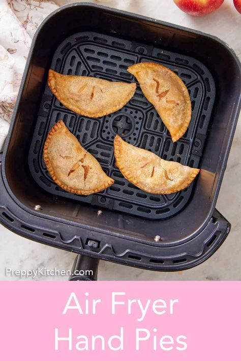 This easy recipe for air fryer hand pies is a must-try this fall! A crisp, flaky crust surrounds a spiced apple pie filling before being sprinkled with coarse sugar. They’re a delicious hand-held treat that bakes up so well in the air fryer! Air Fry Hand Pies, Air Fryer Pies With Pie Crust, Air Fryer Hand Pies, Air Fryer Apple Pie, Fried Hand Pies, Spiced Apple Pie, Recipe For Air Fryer, Air Fryer Recipes Dessert, Apple Pie Filling Recipes