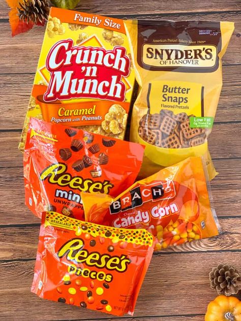 Fall Harvest Caramel Corn Mix - Whiskful Cooking Fall Harvest Caramel Corn, Candy Snack Bar Ideas, Harvest Mix Candy Corn, Autumn Snack Mix Candy Corn, Harvest Popcorn Snack, Autumn Mix Candy Corn, Halloween Bazaar Ideas, Harvest Chex Mix Halloween Party, Fall Snacks For Preschool