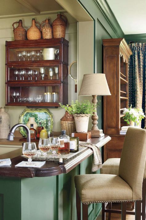 Pub-Style Bar Bookcase In Kitchen, Khaki Walls, Barrister Bookcase, Dining Room Curtains, Built In Cabinet, Southern Living Homes, Keeping Room, Living Room Bookcase, Dining Room Chandelier