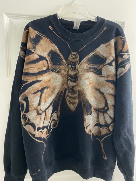 A whimsical, handmade, cotton blend sweatshirt with a one-of-a-kind moth design that has been carefully hand painted with bleach. Bleach Painting Idea, Bleach Sweater Design, Bleach Painting Sweatshirt, Bleach Painted Sweatshirt, Bleach Painted Jacket, Painting On Sweatshirts, Hand Painted Ideas, Bleach Clothes Ideas, Painted Clothing Ideas